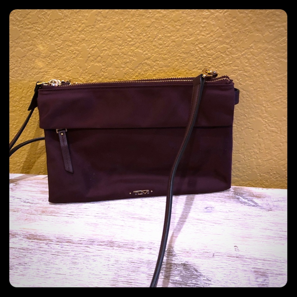 Tumi Crossbody Bag. Color=Eggplant